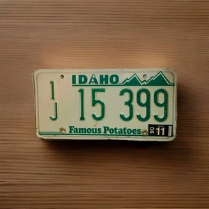 Idaho 1990 Skier Famous Potatoes License Plate 1J15399 Jefferson County Man Cave - Picture 1 of 2