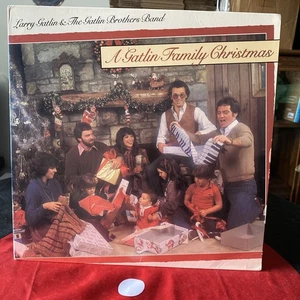 π
πΌ Larry Gatlin & The Gatlin Brothers Band -Family Christmas (1982, Vinyl LP) - Picture 1 of 4