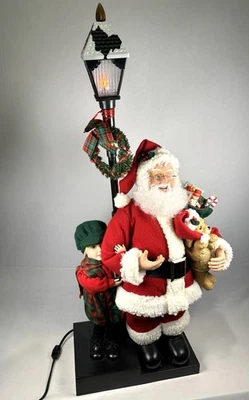 De colección RARO Creaciones de Vacaciones SANTA con NIÑO NIÑA Y CACHORRO Por LAMP POST Animado FUNCIONA Foto 1 de 4