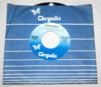 JETHRO TULL - Home / Warm Sporran  (1979 7" 45)  VG+ Vinyl - Image 1 of 2