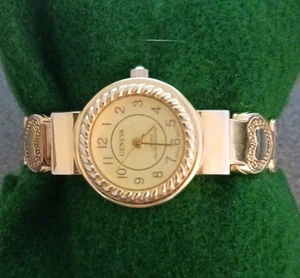 Gold Tone Ladies Geneva Limited W/Heart Spring Loaded Band Fits 6 - 6 1/2" - Picture 1 of 5