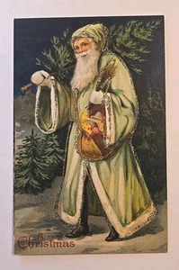 Antigua postal de Navidad, Papá Noel con túnica verde con árbol de Navidad y juguetes, brillo  - Imagen 1 de 6