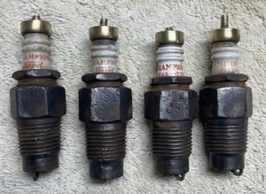 4 Antique Champion Ford Spark Plugs - Picture 1 of 6