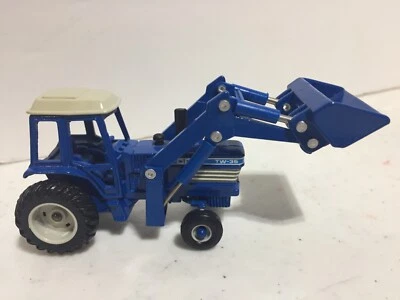 Ford TW-35 Tractor w Front Loader & Cab Slightly Used 1/64 Scale by Ertl - Image 1 of 4