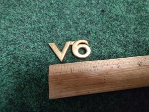 Genuine Toyota Deck Lid Emblem Gold Name Plate Badge V6 75443-AA130 / AA090 5S5 - Picture 1 of 5