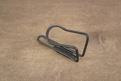 (1) Jaula para botellas de agua de aleación Planet Bike 62 g Foto 1 de 4