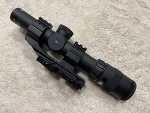 Trijicon TR24G AccuPoint 1-4x24 30mm BAC Triangle Reticle Riflescope - Green - Picture 1 of 13