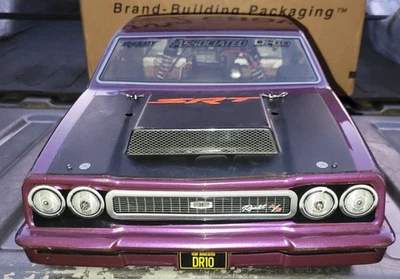 Rodillo de coche de arrastre Traxxas Rustler estirado 2x2 cepillado  Foto 1 de 4