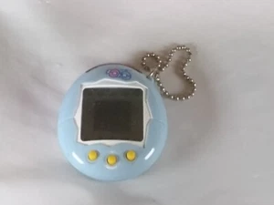 The Return of Tamagotchi Plus Light Blue BANDAI /2004 - Picture 1 of 14
