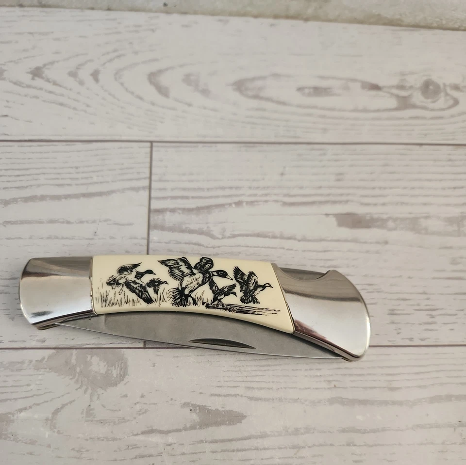 Navaja de bolsillo vintage Sabre China imitación hueso. Foto 1 de 4