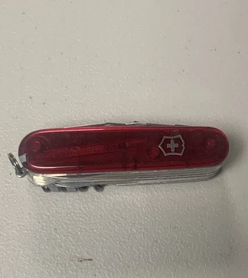 Faca Victorinox Swiss Army 91mm SWISSCHAMP RUBY VERMELHA limpa modelo recente com caneta - Imagem 1 de 4