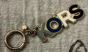 Un raro bel portachiavi vintage MICHAEL KORS tono oro portachiavi clip - Foto 1 di 2