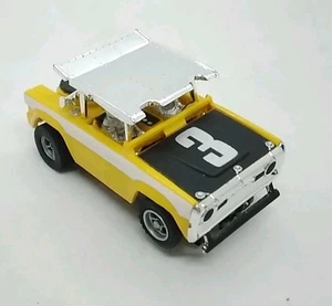 Aurora AFX yellow Ford Baja Bronco w/No. 3 Decal HO Scale Slot Car - WORKS! - Picture 1 of 11