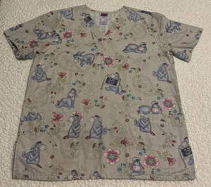 Scrub Top Eeyore By The Wonderful World of Disney Good Condition Medical Size S - Picture 1 of 6