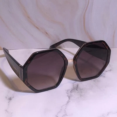 Gafas de sol retro Aldo para mujer marrón tortuga marco hexagonal patrón de panal Foto 1 de 4