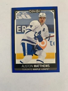 2021-22 O-Pee-Chee Blue #7 Auston Matthews - Toronto Maple Leafs - Picture 1 of 2