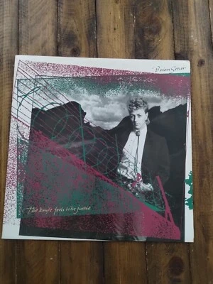 Brian Setzer ~ The Knife Feels Like Justice Vinyl LP Record  1986 EMI ST17178/NM - Image 1 of 3