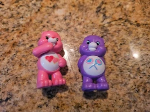 2 Care Bears PVC Posing Figuren rosa & lila - Bild 1 von 3