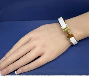 Stunning Woman’s Hermes Gold Tone White Enamal 6.5” Bracelet - Picture 1 of 9