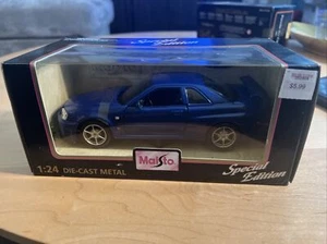 MAISTO 1:24 NISSAN SKYLINE R34 GT-R MIB - Picture 1 of 4