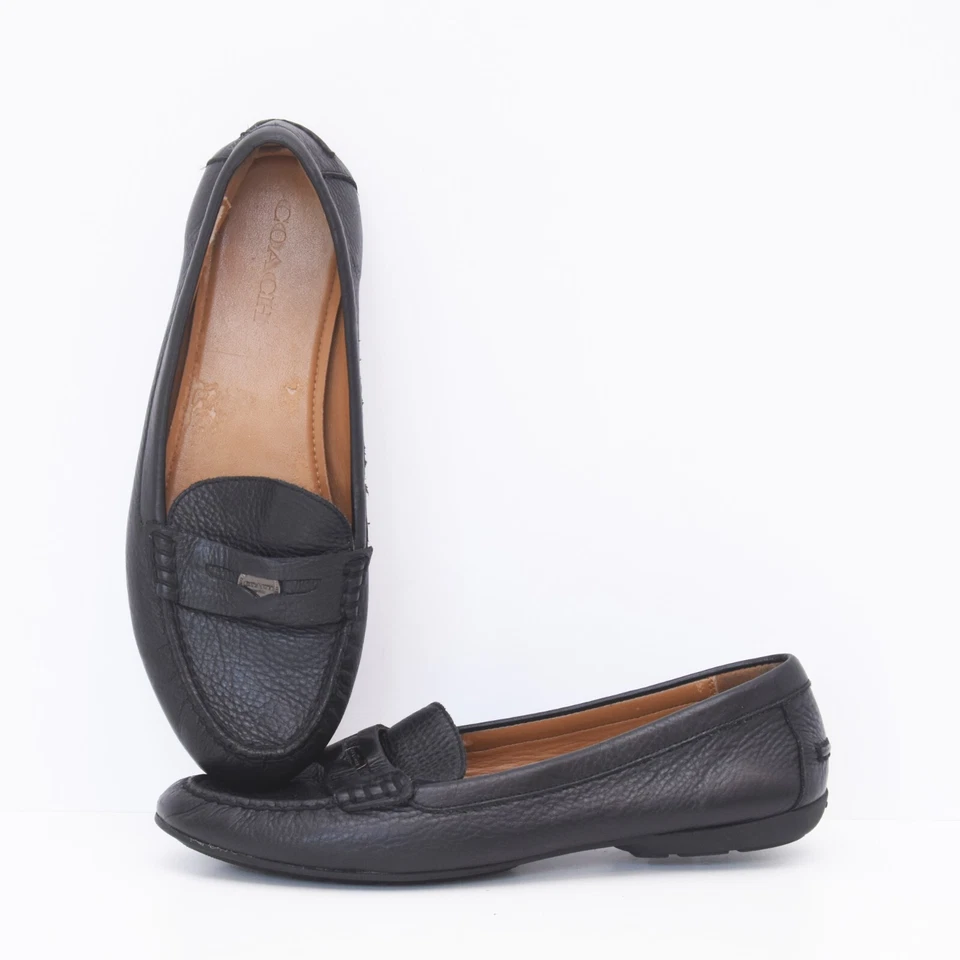 Mocasines Coach Penny negros para dama de cuero granulado negro sin cordones 11B Foto 1 de 4