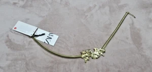 Cinturón elástico para mujer Zara metal dorado flor US30 - Imagen 1 de 4