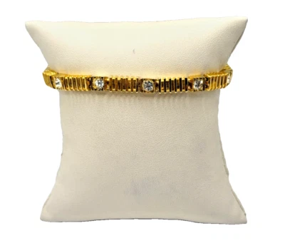 Pulsera chapada en oro con pedrería sintética transparente Foto 1 de 4