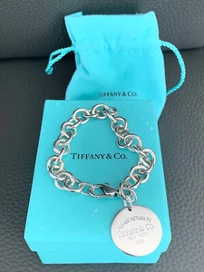 BRACCIALE CATENA TIFFANY & CO RITORNO A TIFFANY ETICHETTA ROTONDA .925 SCATOLA E BORSA ARGENTO - Foto 1 di 6