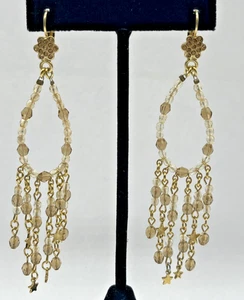 Pendientes colgantes de colección Kirks Folly con cuentas tono dorado estrellas dijes lágrima 4" de largo - Imagen 1 de 10