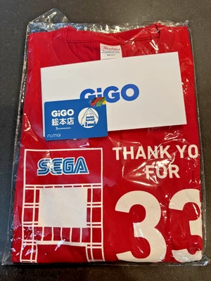 CAMISETA CONMEMORATIVA GIGO AKIHABARA 33 AÑOS VERSIÓN SEGA + TARJETA GIGO 2ª AIME Foto 1 de 4