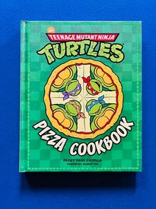 The Teenage Mutant Ninja Turtles Pizza Cookbook by Peggy Paul Casella 2017 NEW - Foto 1 di 3