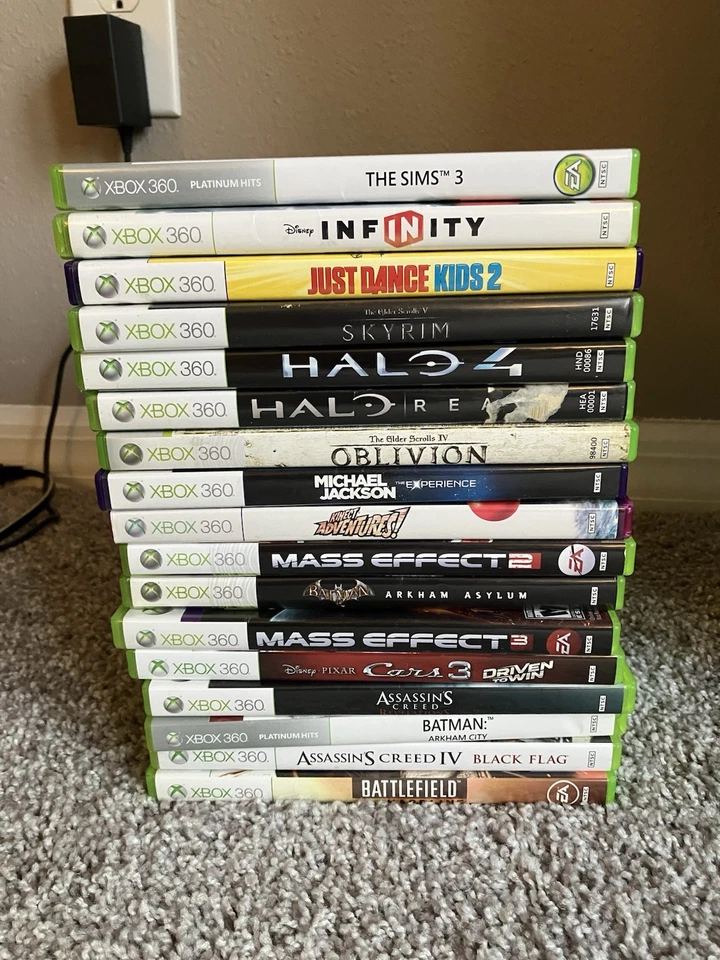 Lote de 17 juegos Xbox 360, Sims, Halo, Just Dance, Skyrim, Batman Arkham, PROBADO Foto 1 de 4