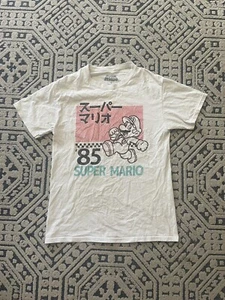 Junior Ladies Super Mario Bros Super Mario 85 White Graphic T-shirt. Size Small - Picture 1 of 15