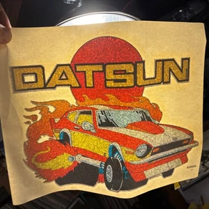 Vintage DATSUN GLITTER T-SHIRT IRON-ON TRANSFER pretty darn awesome! - Picture 1 of 3