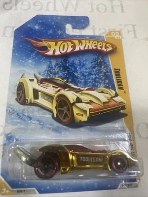 Hot Wheels 2010 New Models #2 Tooligan gold snowflake card, i combine shipping - Image 1 of 3