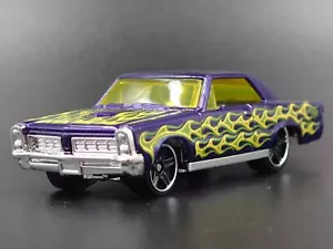 1965 65 PONTIAC GTO MUSCLE CAR 1:64 MASSSTAB SAMMLERSTÜCK DIORAMA DIECAST MODELLAUTO - Bild 1 von 4