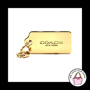 New Small 1.25" COACH NEW YORK Gold Brass Metal Fob Bag Charm Keychain Hang Tag - Picture 1 of 1