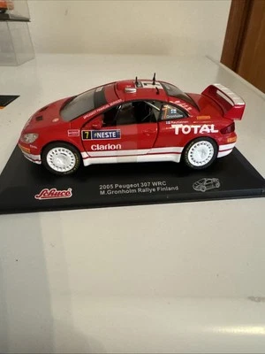 Modellino Peugeot 307 WRC Rallye Finlandia 2095, Schuco Scala 1/32 - Immagine 1 di 4