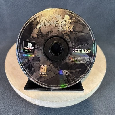 PlayStation 1 - Street Fighter EX Plus Alpha - SOLO DISCO - Resurgido y probado Foto 1 de 2