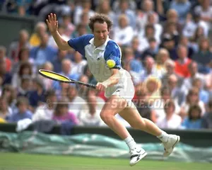 John McEnroe backhand lunge  8x10 11x14 16x20 photo 679 - Picture 1 of 1