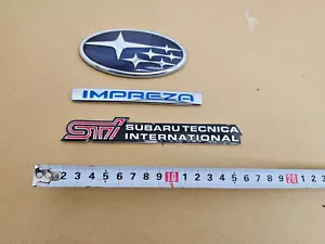 JDM SUBARU IMPREZA GG2 GG9 STI TECNICA INTERNATIONAL TRUNK EMBLEMS SET OEM - Picture 1 of 4
