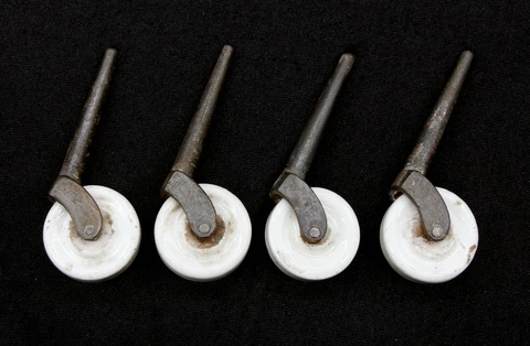 Set of Antique White Porcelain 1.625 in. Caster Wheels Cover