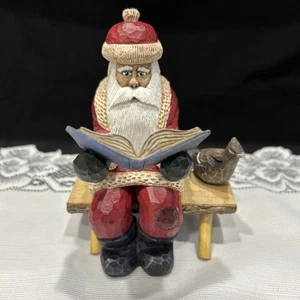 Sitting Santa On Bench Reading A Book Coping With A Reindeer Chapter 1 - Picture 1 of 5