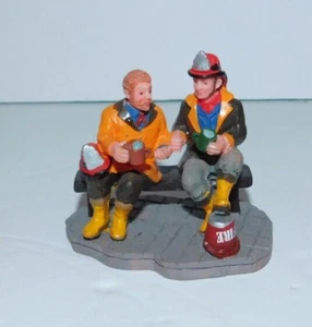 NEAT CHRISTMAS VILLAGE FIGURINE 2 FIREMEN DRINKING COFFEE LEMAX? - Picture 1 of 4