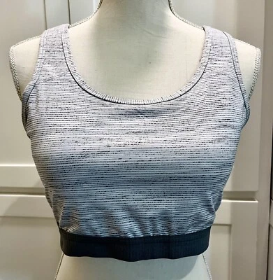 Top corto deportivo Avia talla 16/18 espalda corredor gris elástico forrado de poliéster acolchado Foto 1 de 3