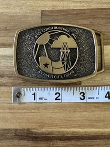 Brass Belt Buckle KCI Constructors Denver City Texas 1983 BTS Vintage 3.5x2.5 In - Picture 1 of 3