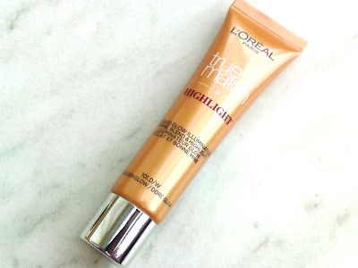 L'Oréal Paris Flüssig Glow Highlighter Make-Up 101.D/W Golden Glow 30ml Neu - Bild 1 von 2