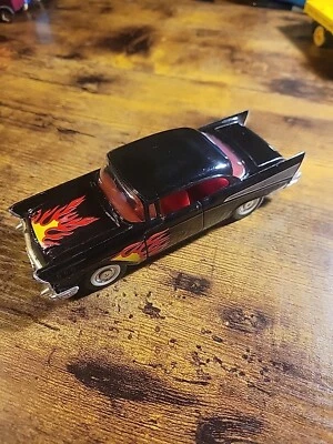 Majorette 1957 Chevy Bel Air 1:34 Scale Black with Flames - Image 1 of 4