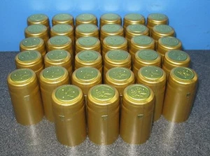 SHRINK CAPSULES 100 NUGGET GOLD WINERY QUALITY PVC WINEMAKING BOTTLE HEAT CAPS - Picture 1 of 1