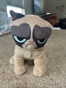 Peluche gatto scontroso fabbrica dei giocattoli - Foto 1 di 4